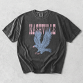 Nashville Eagle Graphic Tee in black cotton with distressed pink lettering and a blue flying eagle graphic