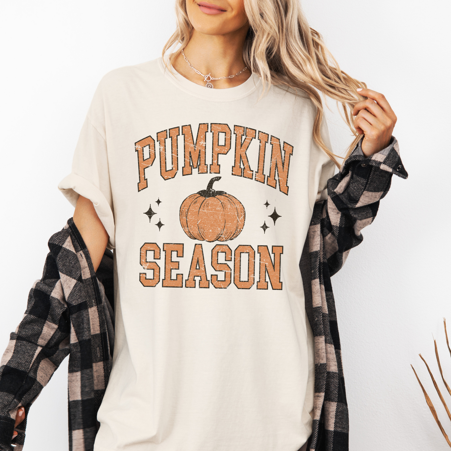 Pumpkin Season Graphic Tee in cream cotton with distressed orange pumpkin graphic and bold retro lettering