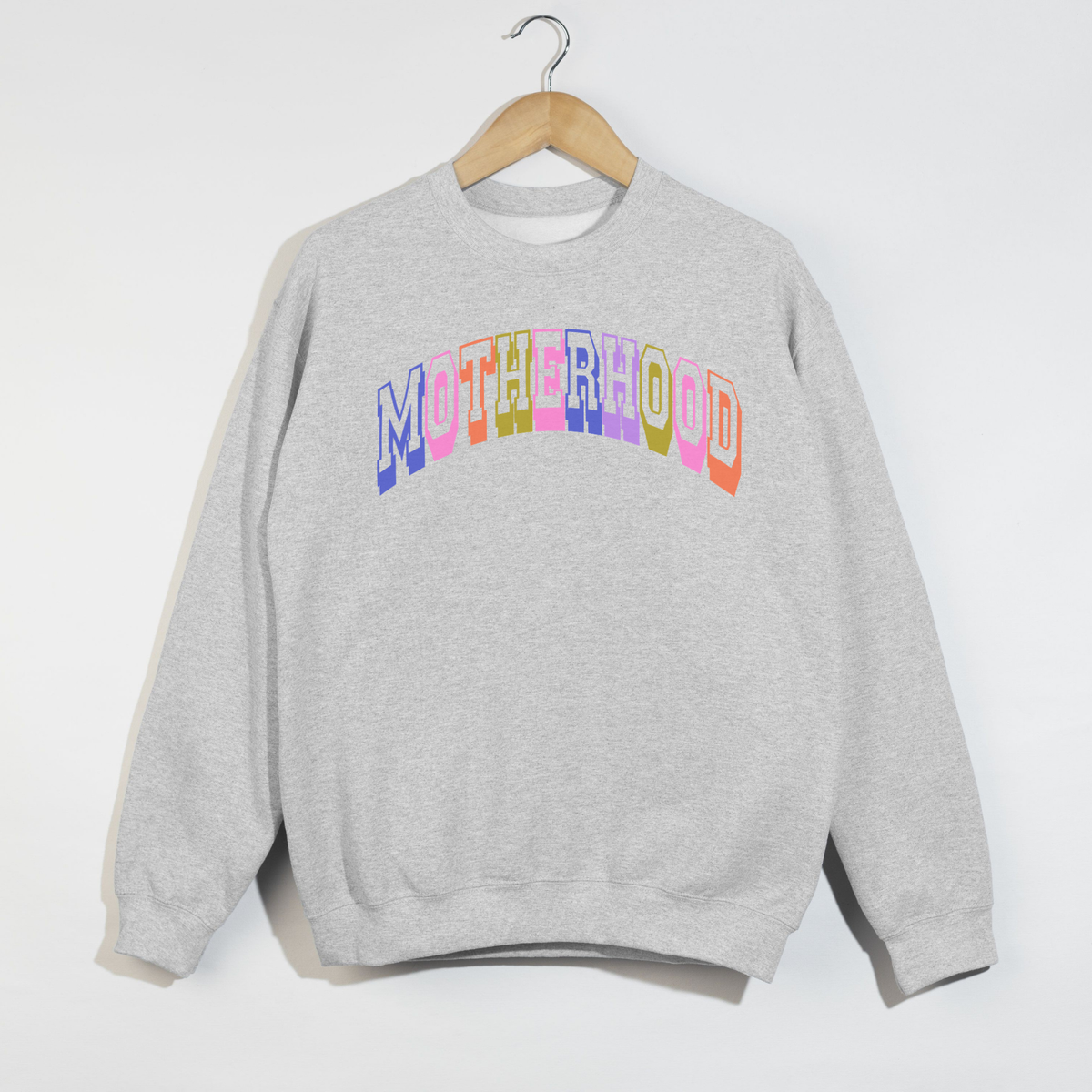 Retro Motherhood Sweatshirt in heather grey fleece with colourful collegiate lettering and ribbed cuffs