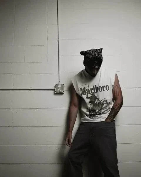 Rugged Man Cut Off Tee in vintage white cotton, featuring a bold Marlboro graphic and raw sleeveless edges