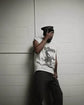 Rugged Man Cut Off Tee in vintage white cotton, featuring a distressed Marlboro graphic and raw armholes