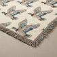 Rustic Cabin Throw featuring a woven beige cotton fabric with flying mallard duck pattern and multicolor fringed edges
