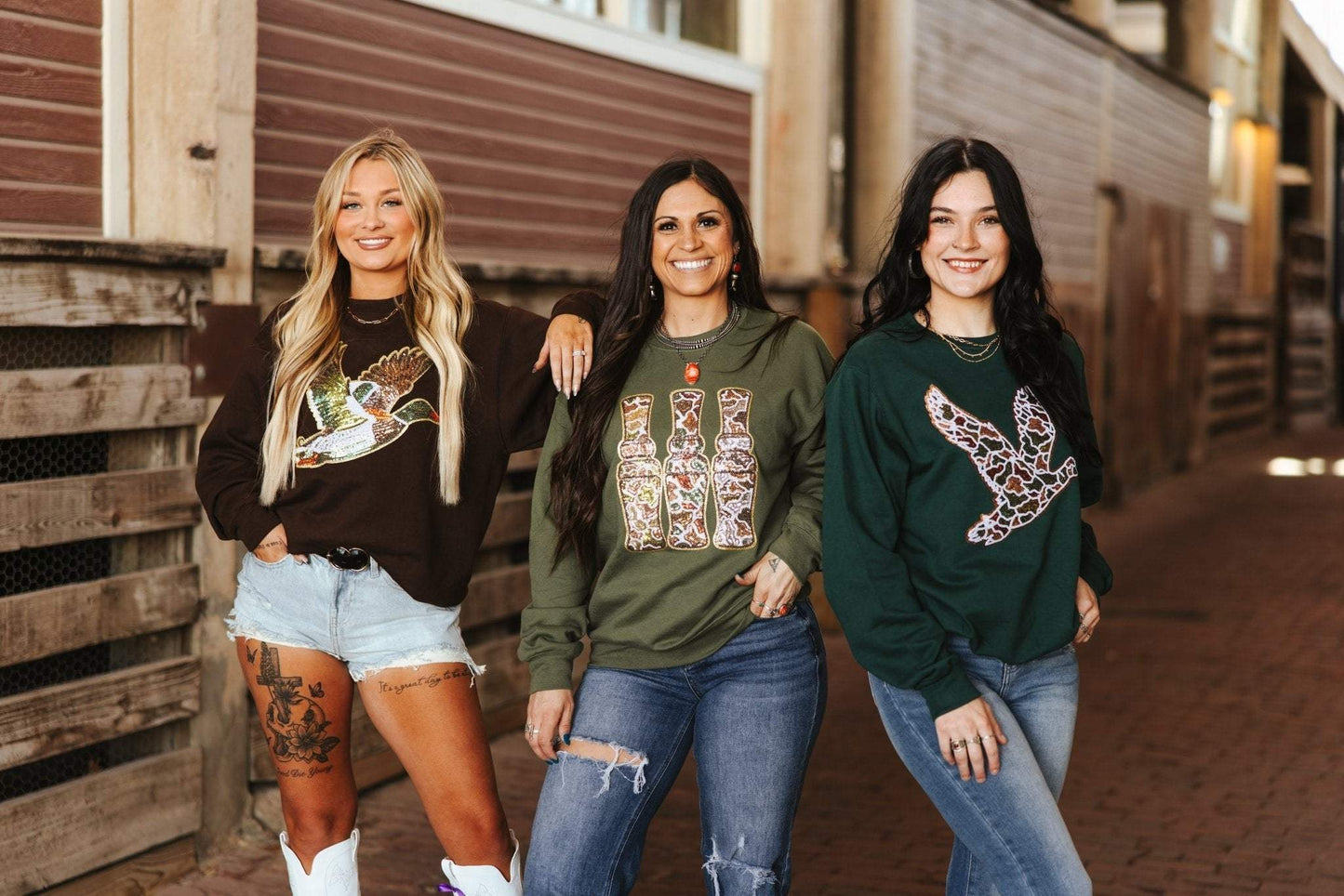 Unisex sweatshirt with sequin mallard duck patch on cotton-poly blend