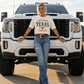 She's From Texas cropped tee in cream cotton with burnt orange longhorn graphic and boxy fit