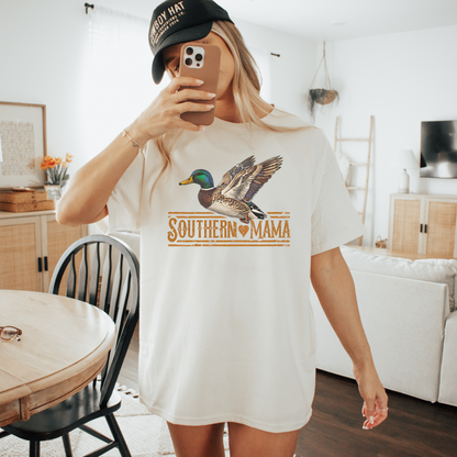 Southern Mama Duck T Shirt in white cotton, featuring a colorful flying duck and vintage Southern Mama graphic

