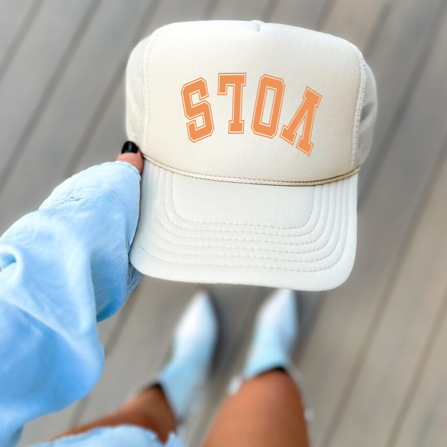 Sports Team Hat in cream foam with upside-down orange VOLS lettering and stitched trucker cap design