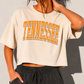 Tennessee pride boxy cropped graphic tee in ivory cotton with bold orange collegiate Tennessee lettering and crew neck