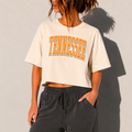 Graphic tee in ivory cotton with orange Tennessee collegiate lettering, cropped boxy fit and Tennessee pride design