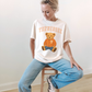 Tennessee Teddy Bear graphic tee in white cotton with orange Tennessee lettering and seated teddy bear design