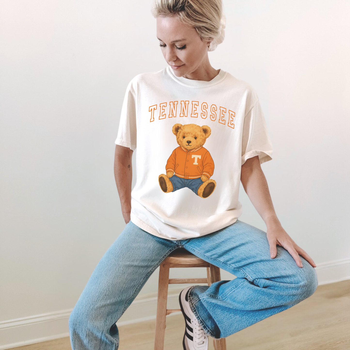 Tennessee Teddy Bear graphic tee in white cotton with orange Tennessee lettering and seated teddy bear design