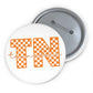 Tennessee TN Checkerboard pin button with orange and white check pattern and scripted text on glossy round metal surface