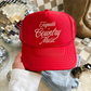 Trucker hat in red with structured fabric front and cream Tequila & Country Music script lettering