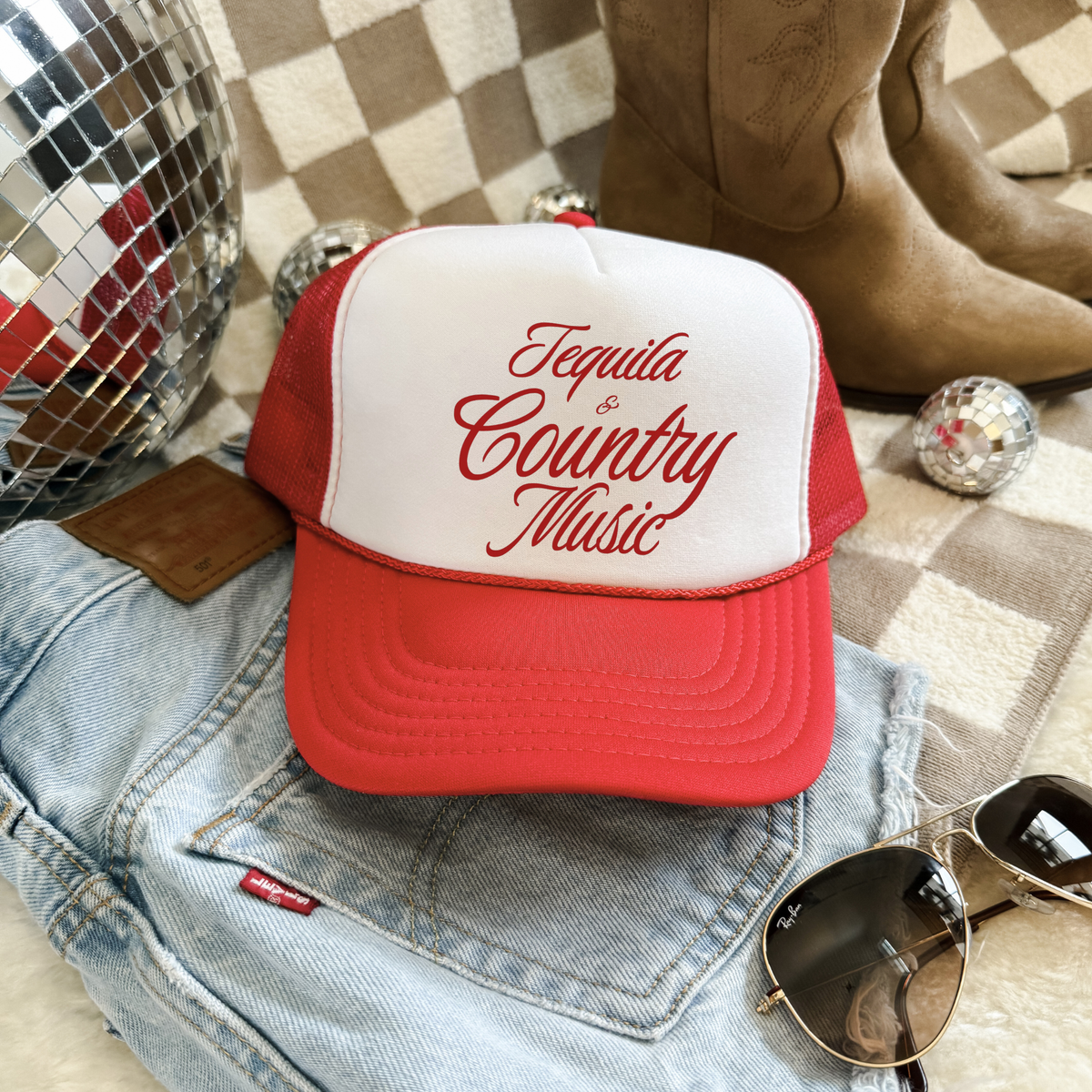 Tequila & Country Music red and white trucker hat with script lettering and breathable mesh side panels