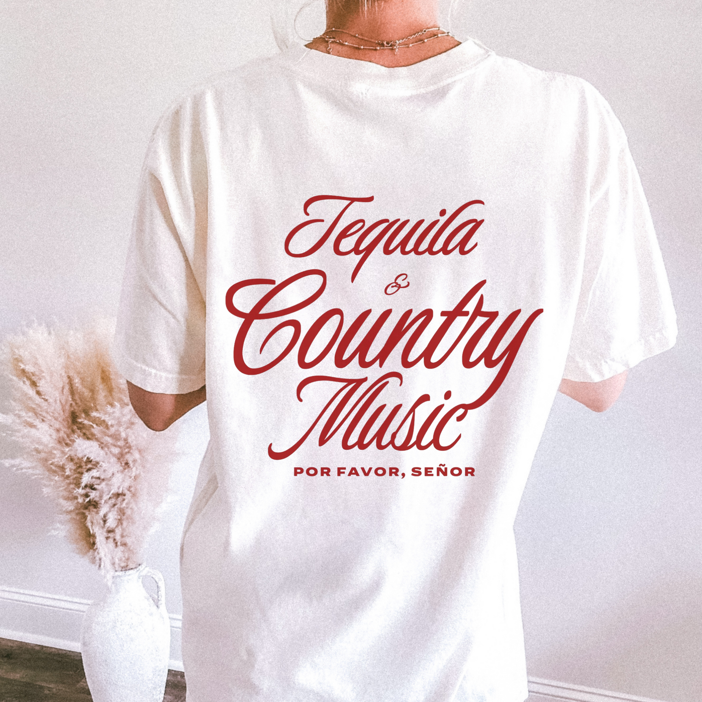 Tequila & Country Music graphic tee in white cotton with bold red script lettering and oversized relaxed fit