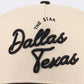 The Dallas Script Hat in beige with raised black Dallas Texas script embroidery and The Star lettering