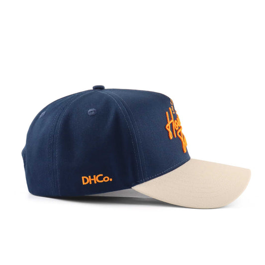 The "Houston" Script Hat, navy and beige pre-curved cap with orange script embroidery and side logo
