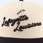 The Lafayette Script Hat in beige and black with raised script embroidery reading Lafayette Louisiana and Ragin'