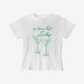 Tini Bit Lucky Tee white women's T-shirt with green script and shamrock martini glass graphic