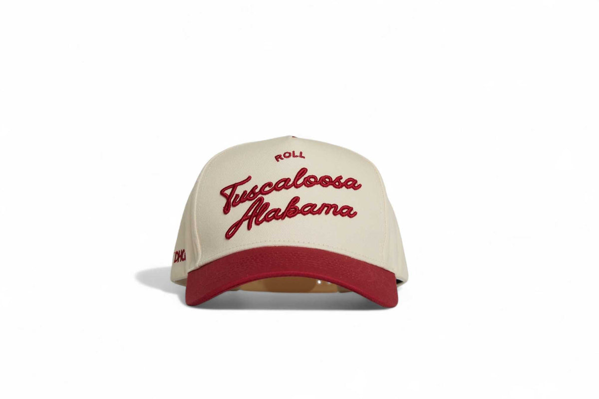Tuscaloosa Script Hat in beige with red embroidered script, red pre-curved brim, and structured trucker design