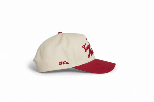 Tuscaloosa Script Hat in cream with a red curved brim and embroidered script lettering