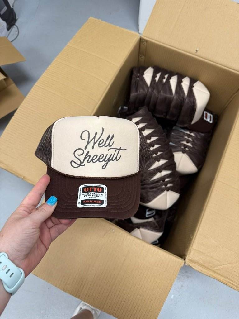 Well Sheeyit Trucker Hat with breathable mesh back and adjustable snap closure