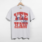 Graphic T-shirt in white cotton with distressed red and blue cowboy and rope western print for western-inspired outfits