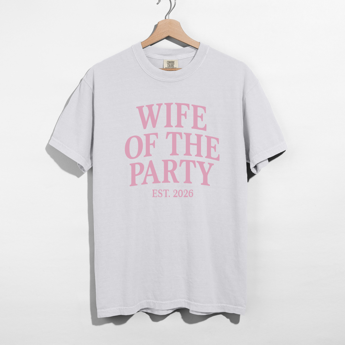 Wife of the Party T-shirt in white cotton with bold pink lettering and Est. 2026 graphic