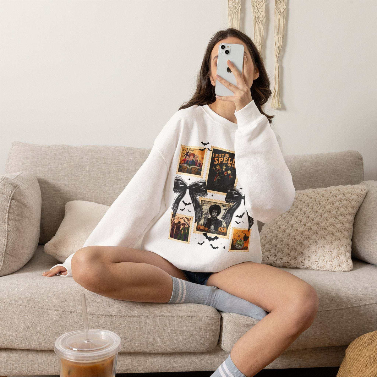 Vintage witch spell collage sweatshirt with Halloween graphics
