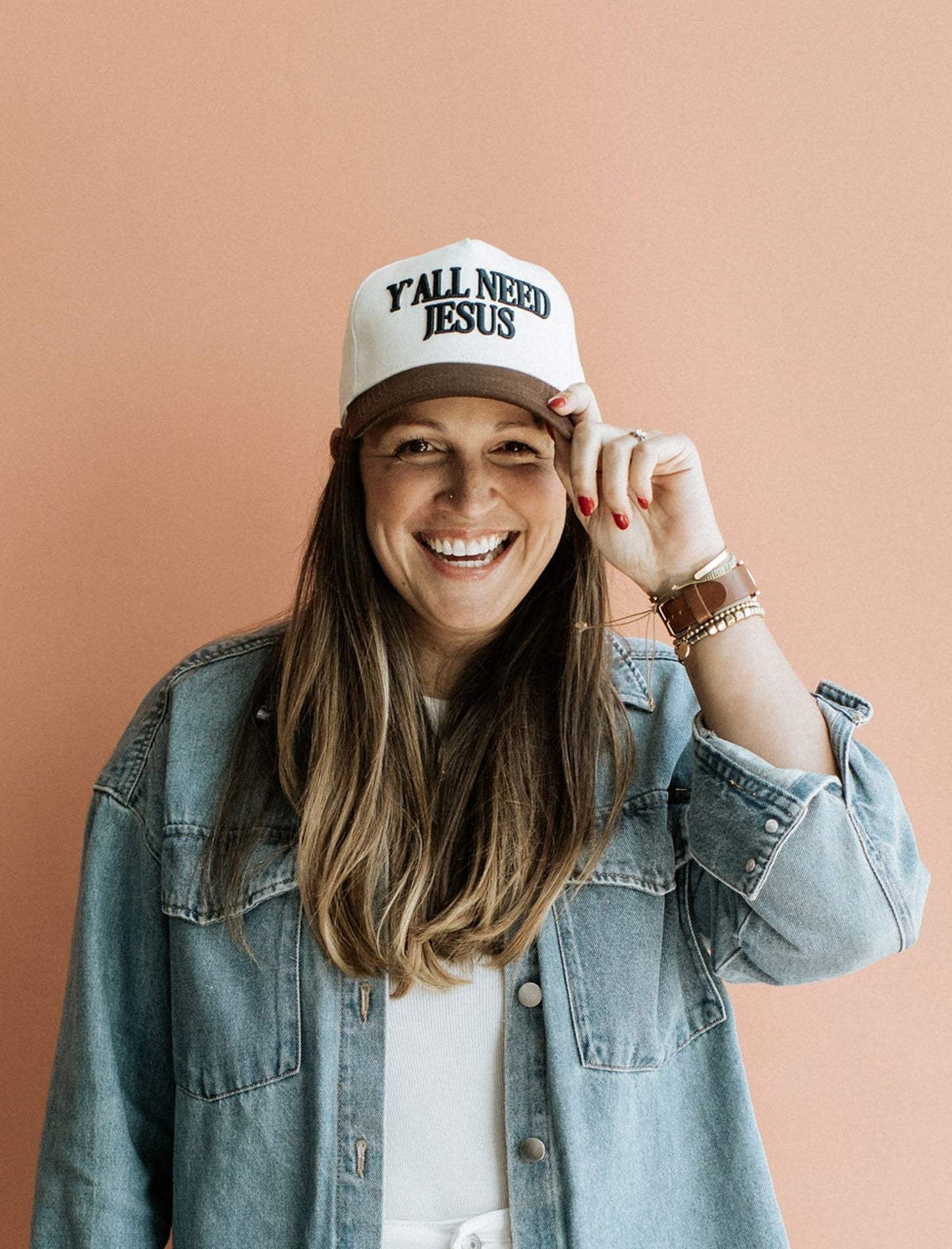 Y'all Need Jesus hat in cream cotton with brown bill and bold embroidered lettering