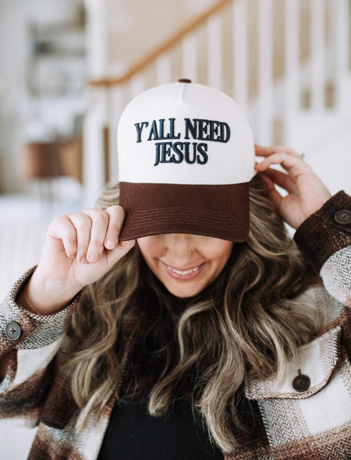 Y'all Need Jesus hat in cream and brown cotton with bold embroidered lettering and a curved brown bill
